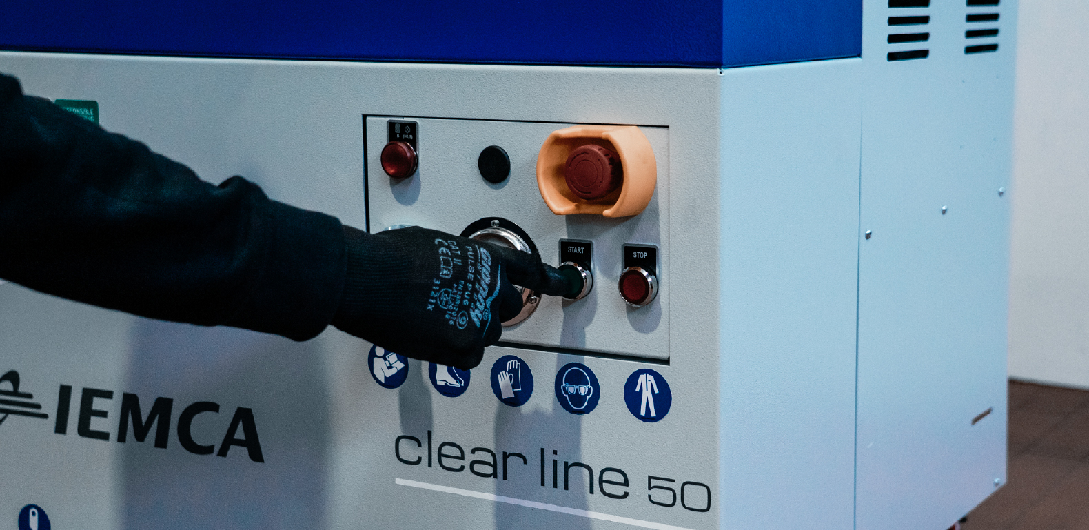 Operator activating the Iemca Clear Line 50 high-pressure system